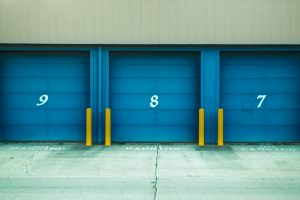 blue self storage units with numbers on roller doors, perfect for digital nomads